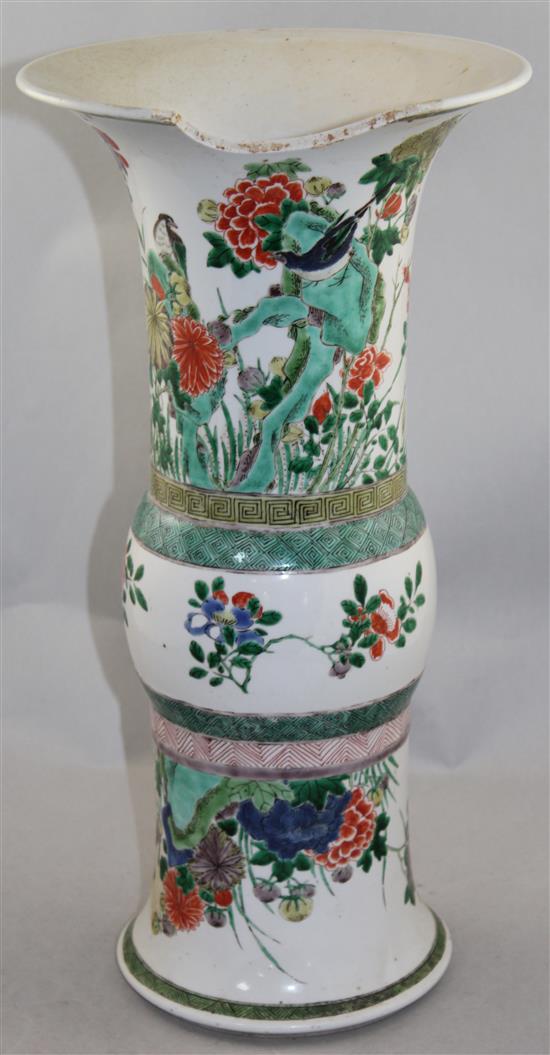 A large Chinese famille verte beaker vase, Gu, Kangxi period, 44.5cm, 11 x 3.5cm section of rim lacking